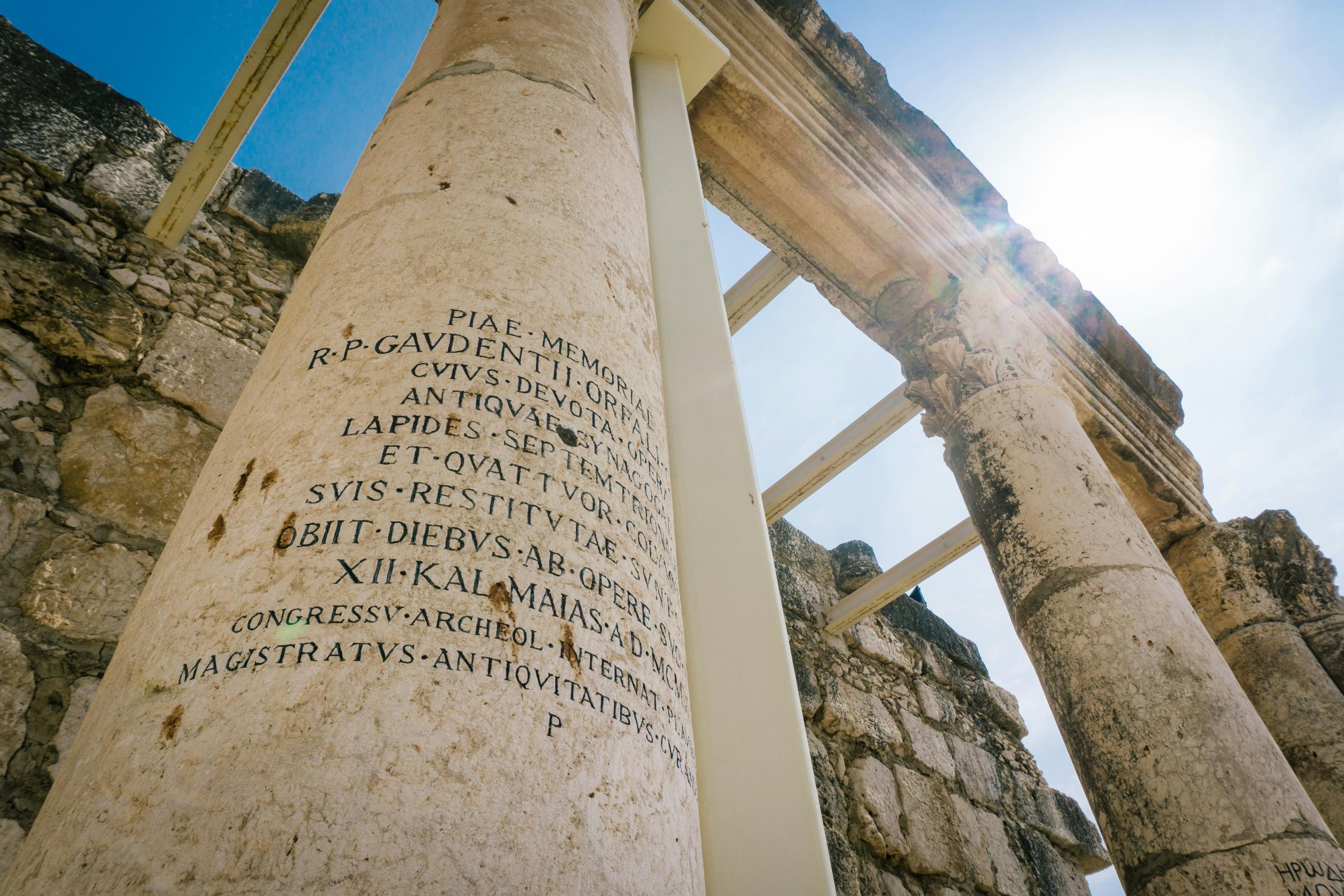 column and pillars with ancient greek writing on them