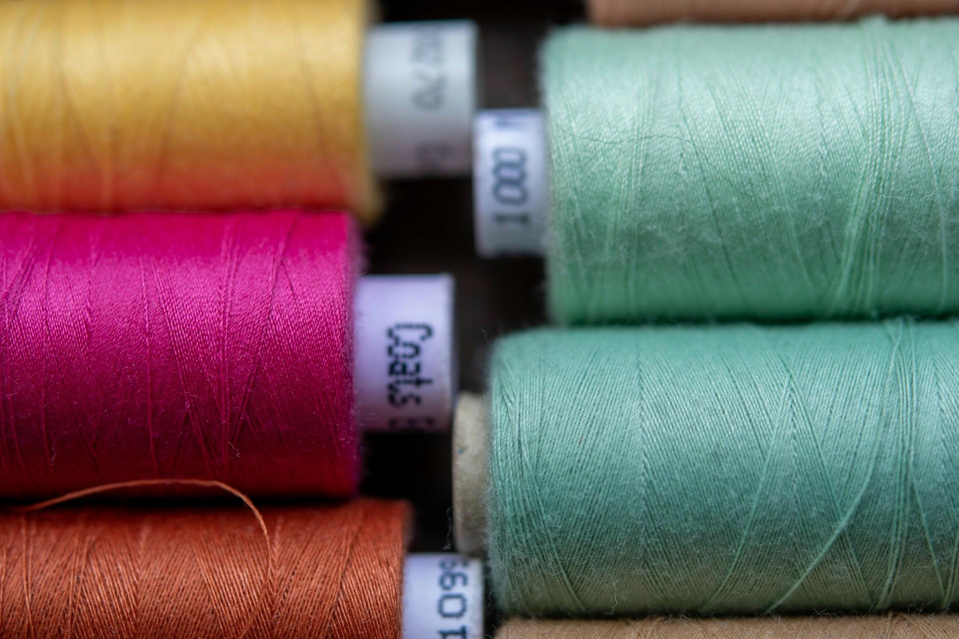 Various colours of sewing thread