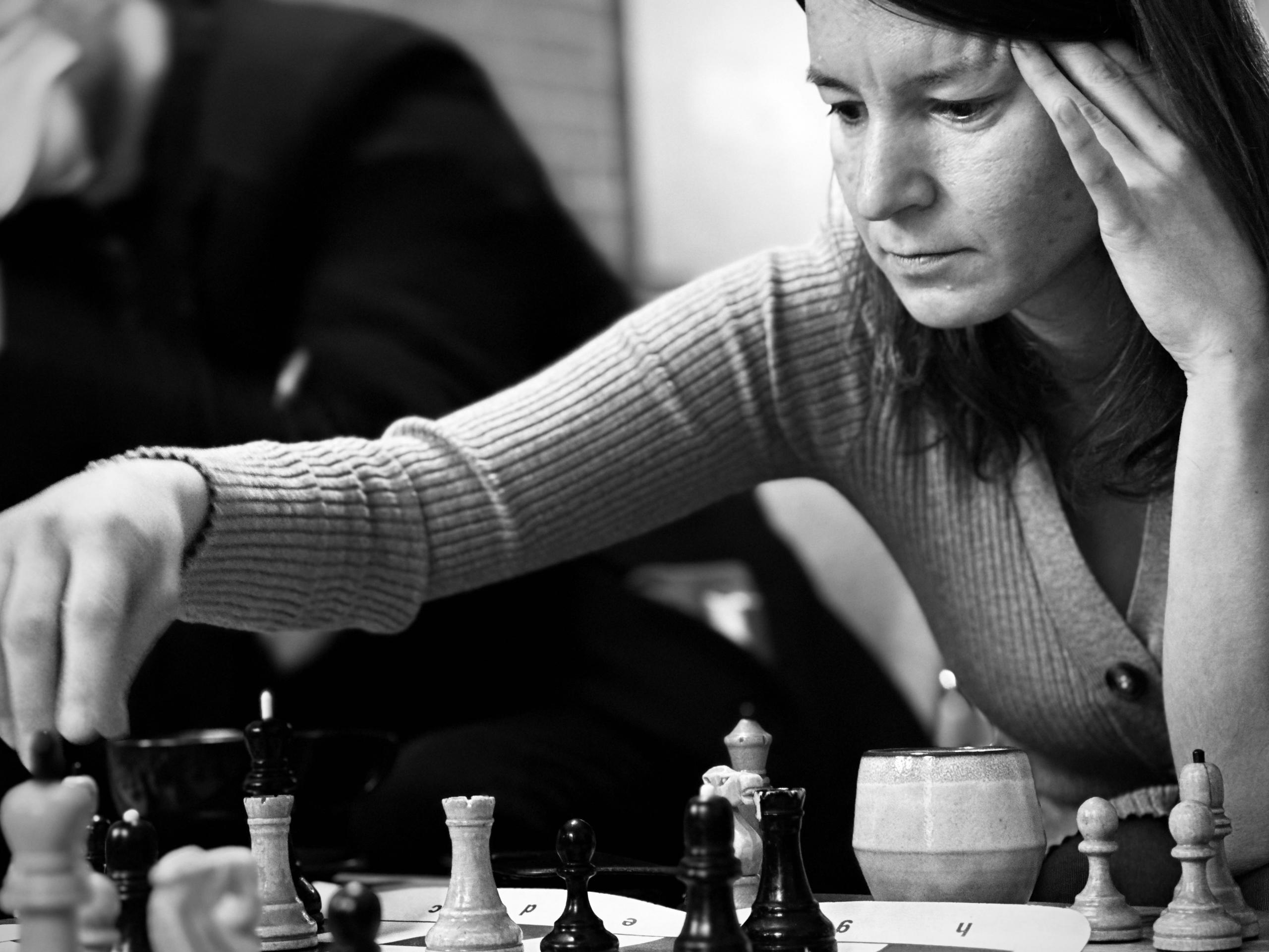 woman playing chess