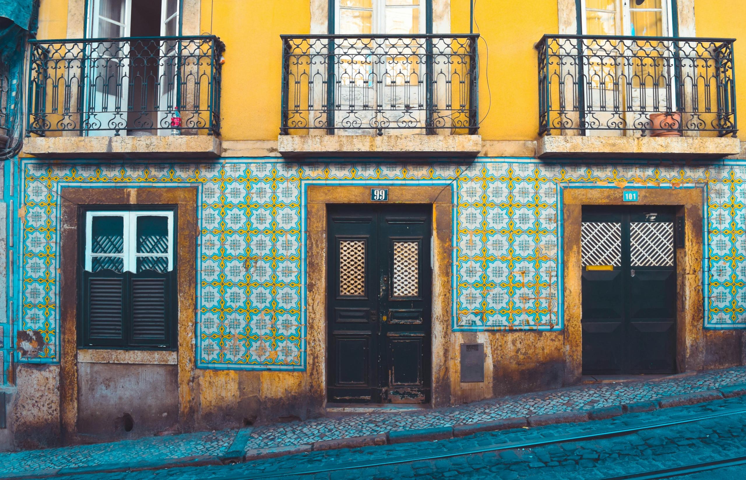 colourful tiled houses on the streets of portugal