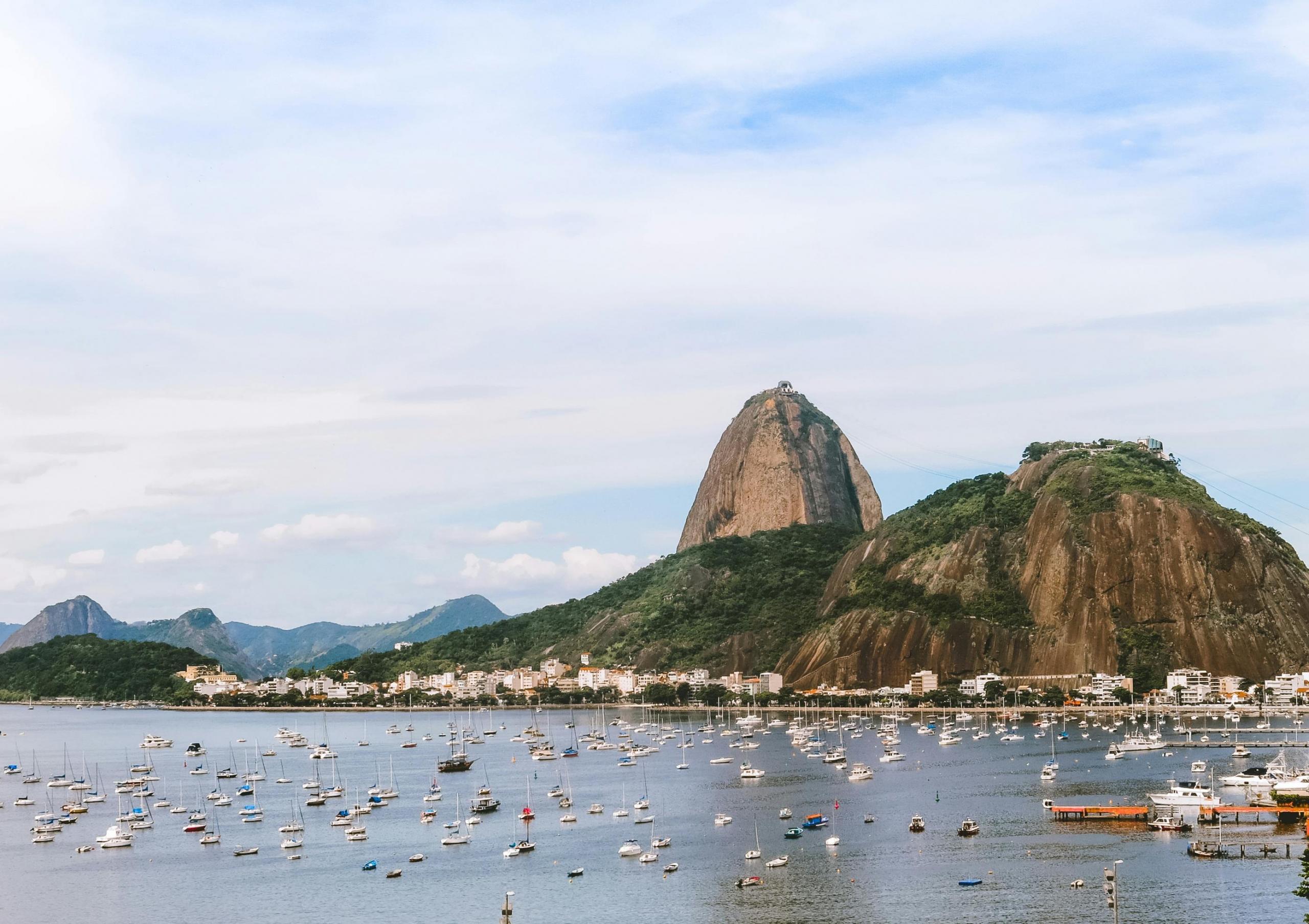 beach in brazil flanked by hills