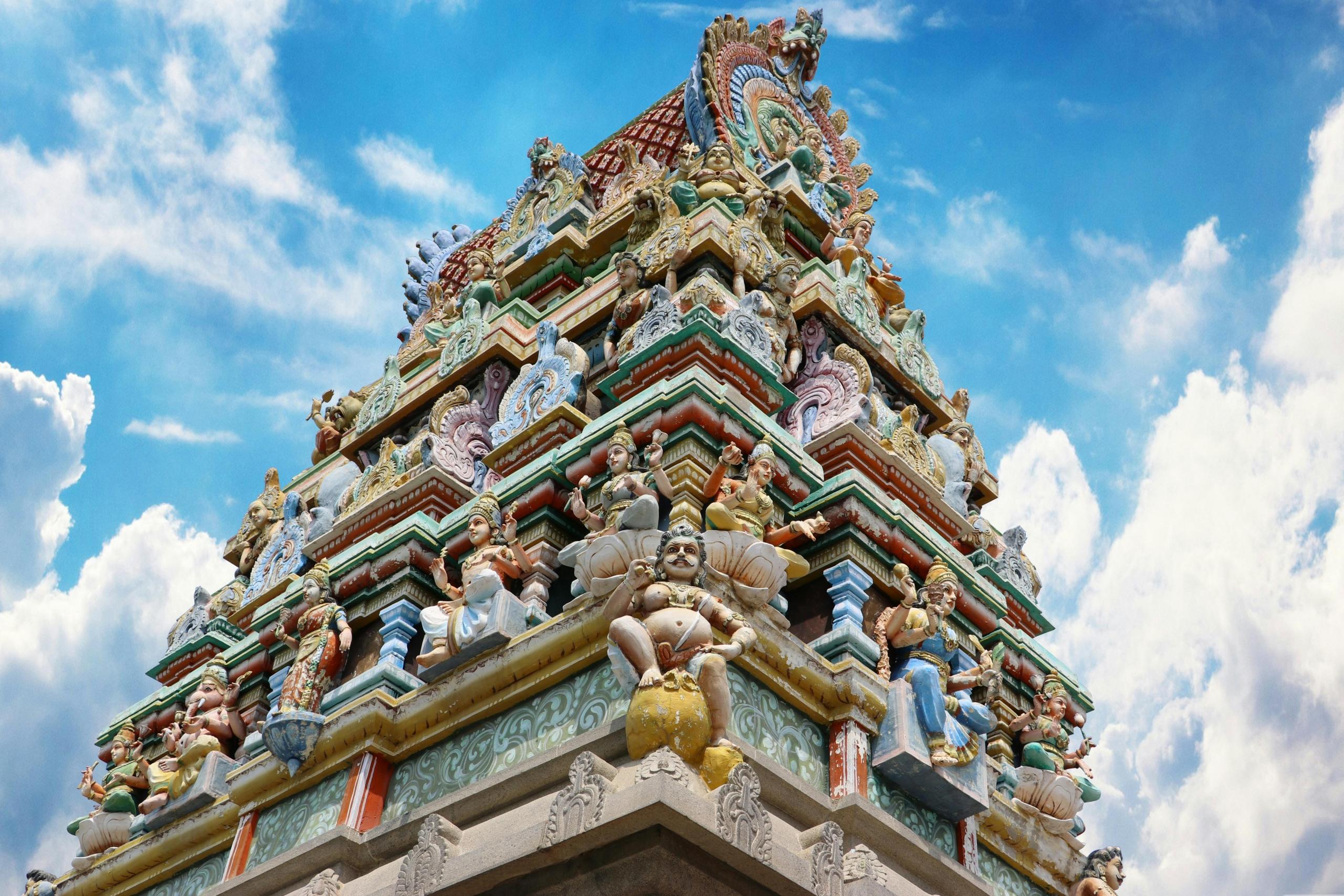 colourful indian shrine depicting deities