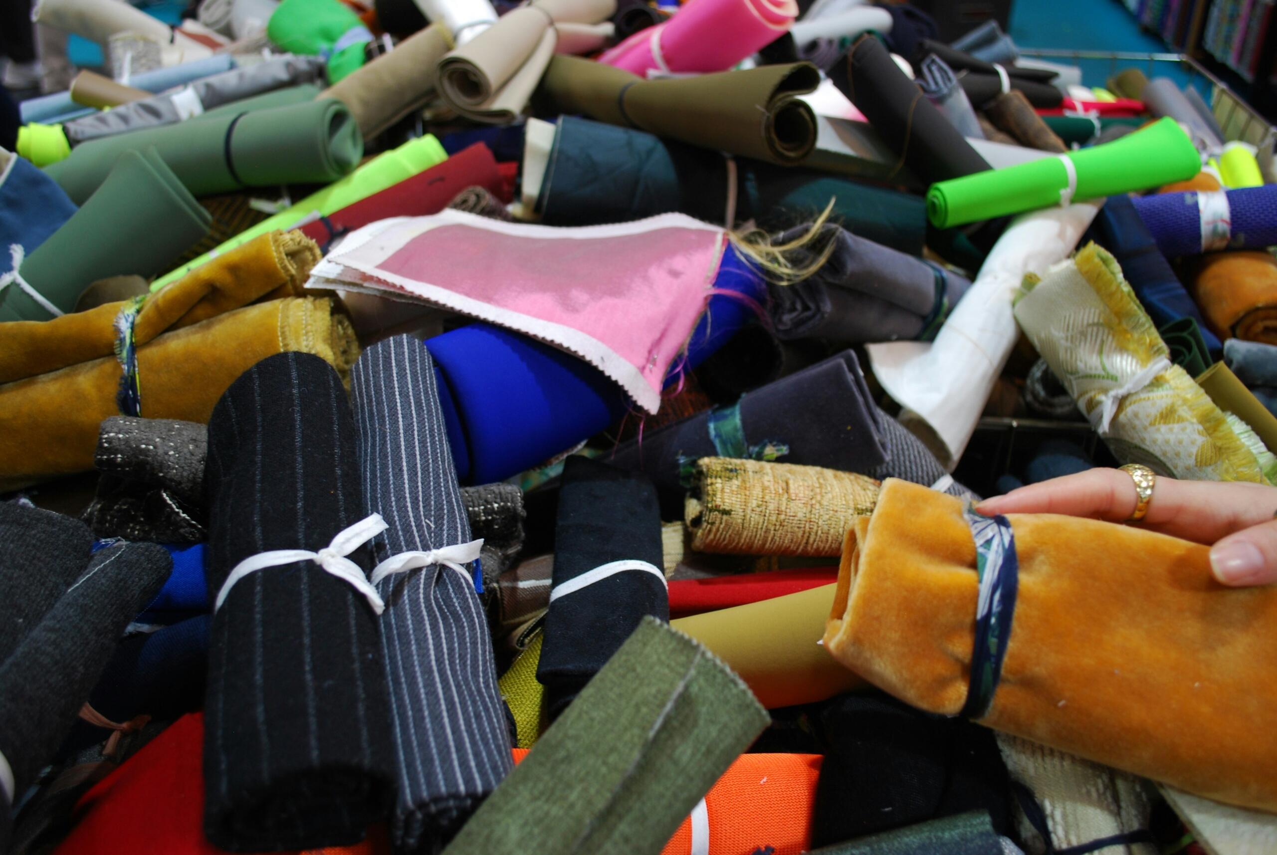 assorted pieces of fabric arranged in a pile