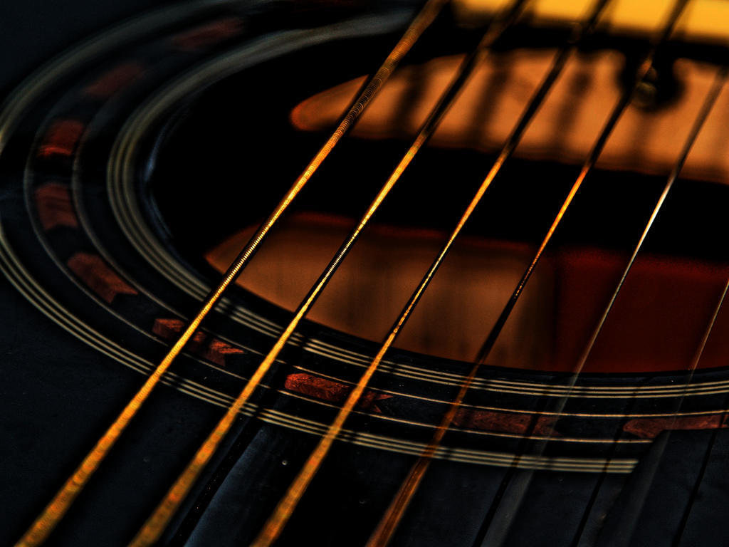 guitar strings over the sound hole