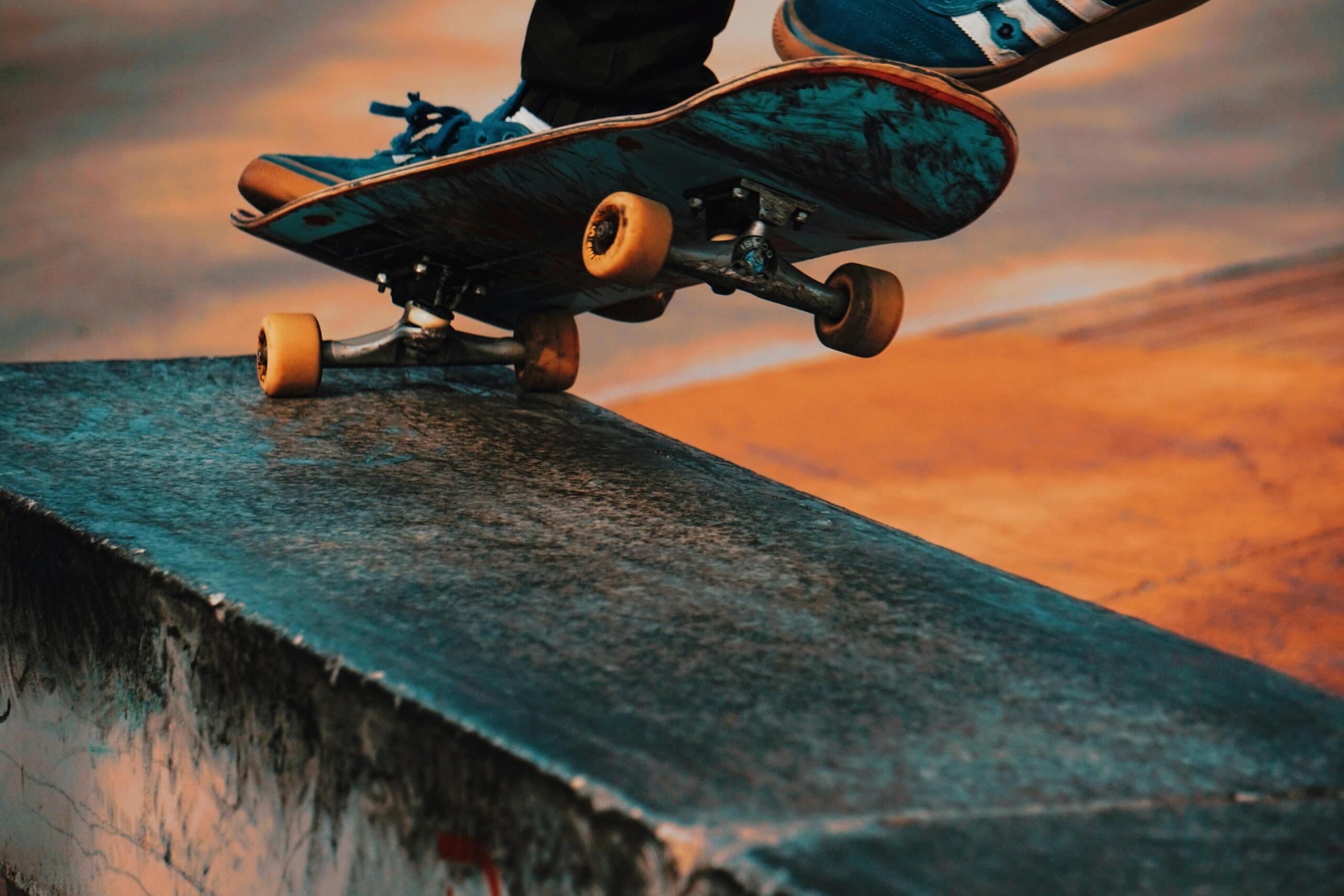 close up of a skateboarder's feet and the skateboard on a ramp