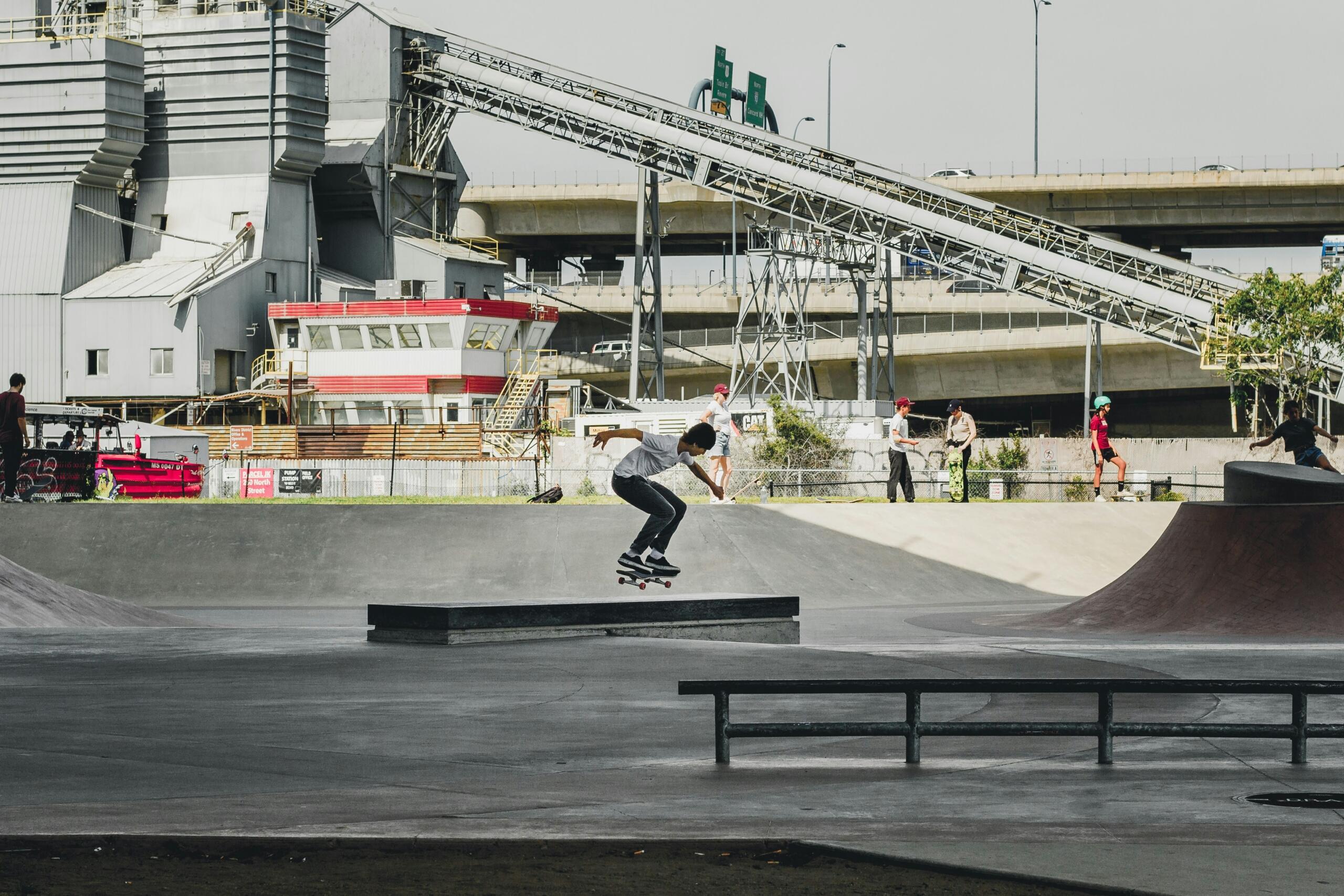 Boy on a skateboard trying a skating trick