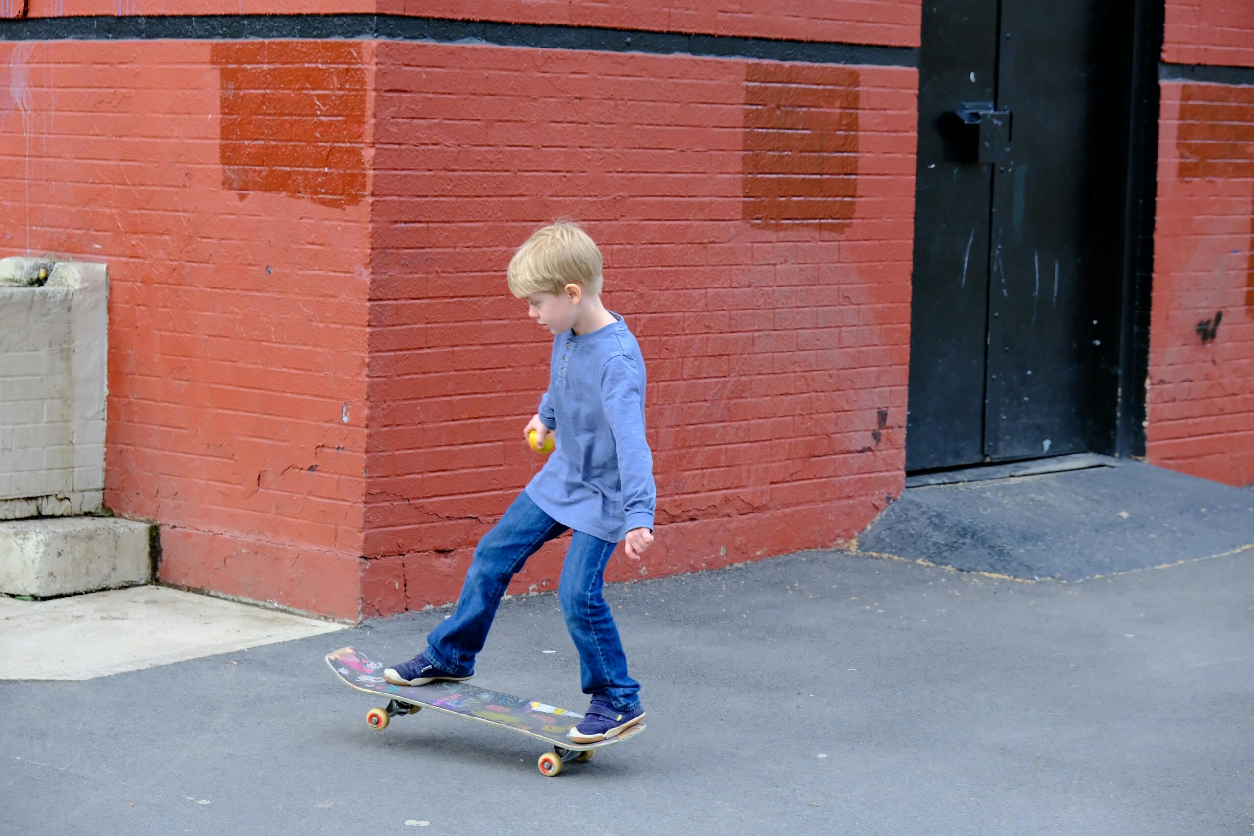 A child riding a skateboard