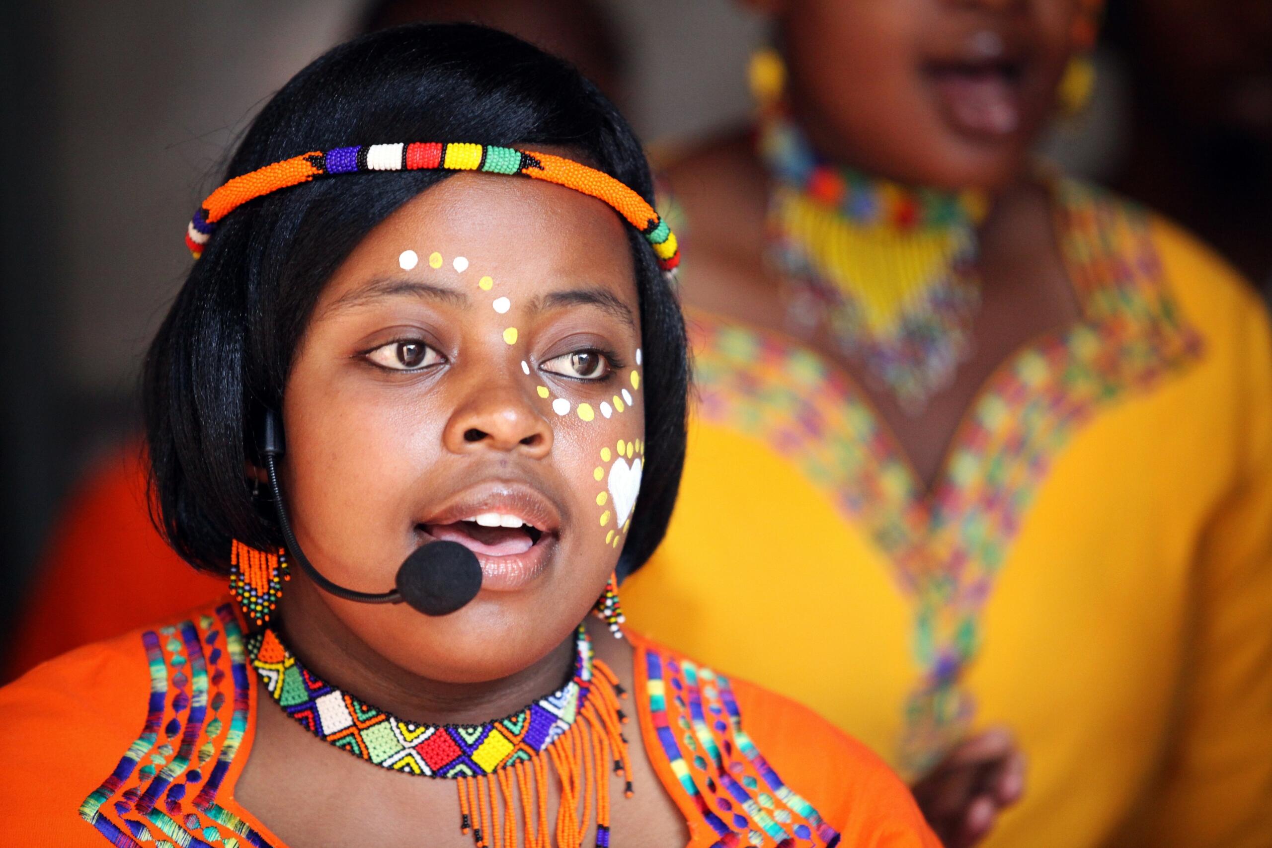 A portrait of a woman in traditional dress.