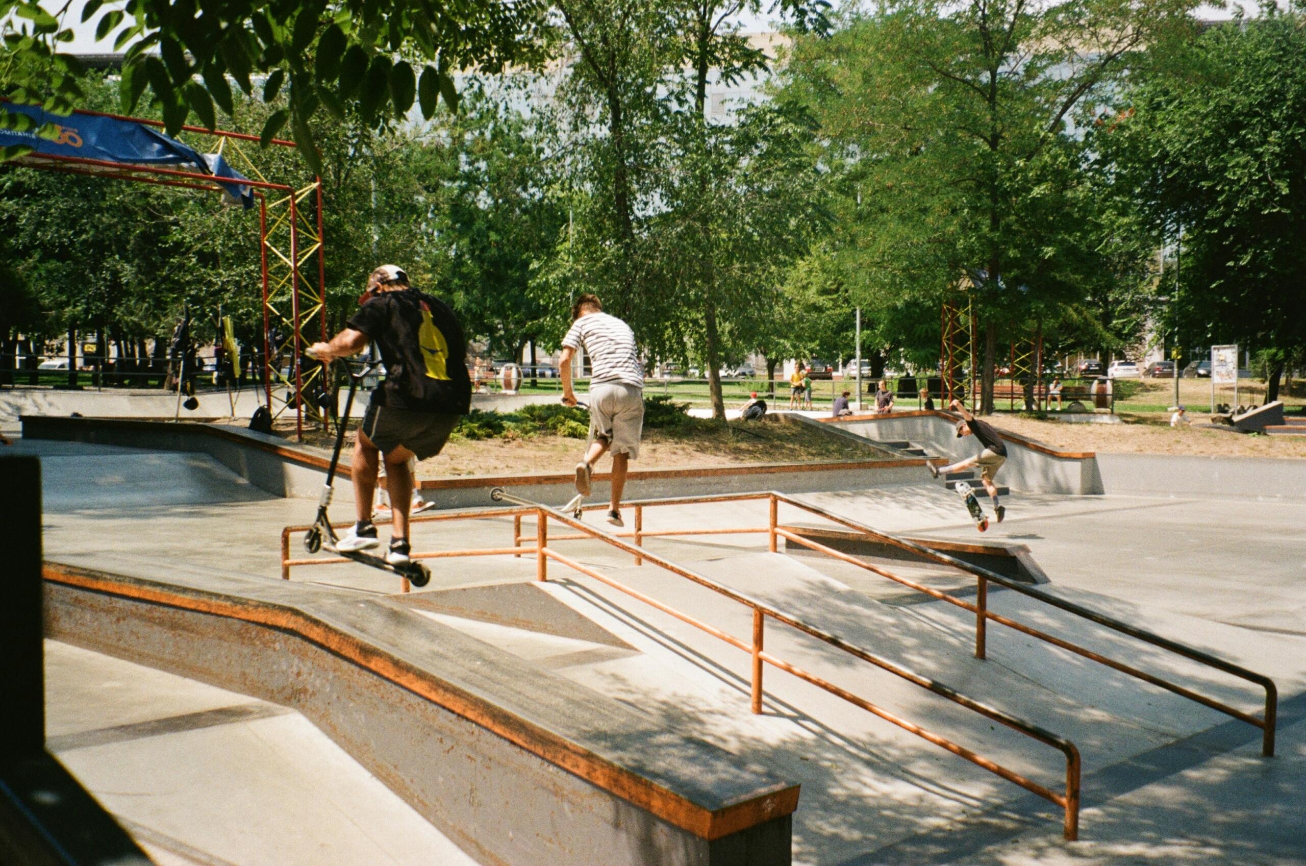Two boys at an outdoor skatepark
