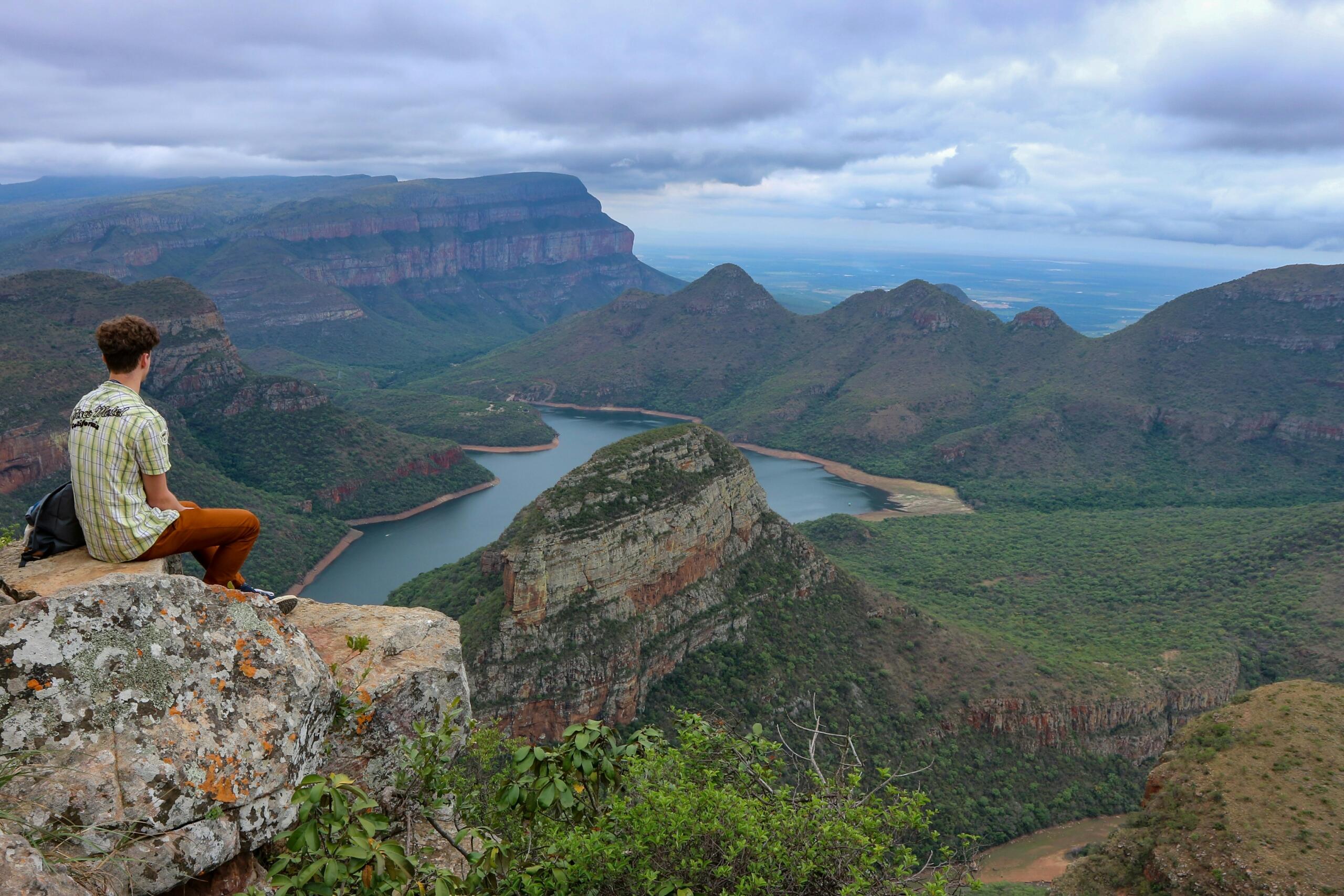 An image of a person overlooking the Blyde River Canyon.