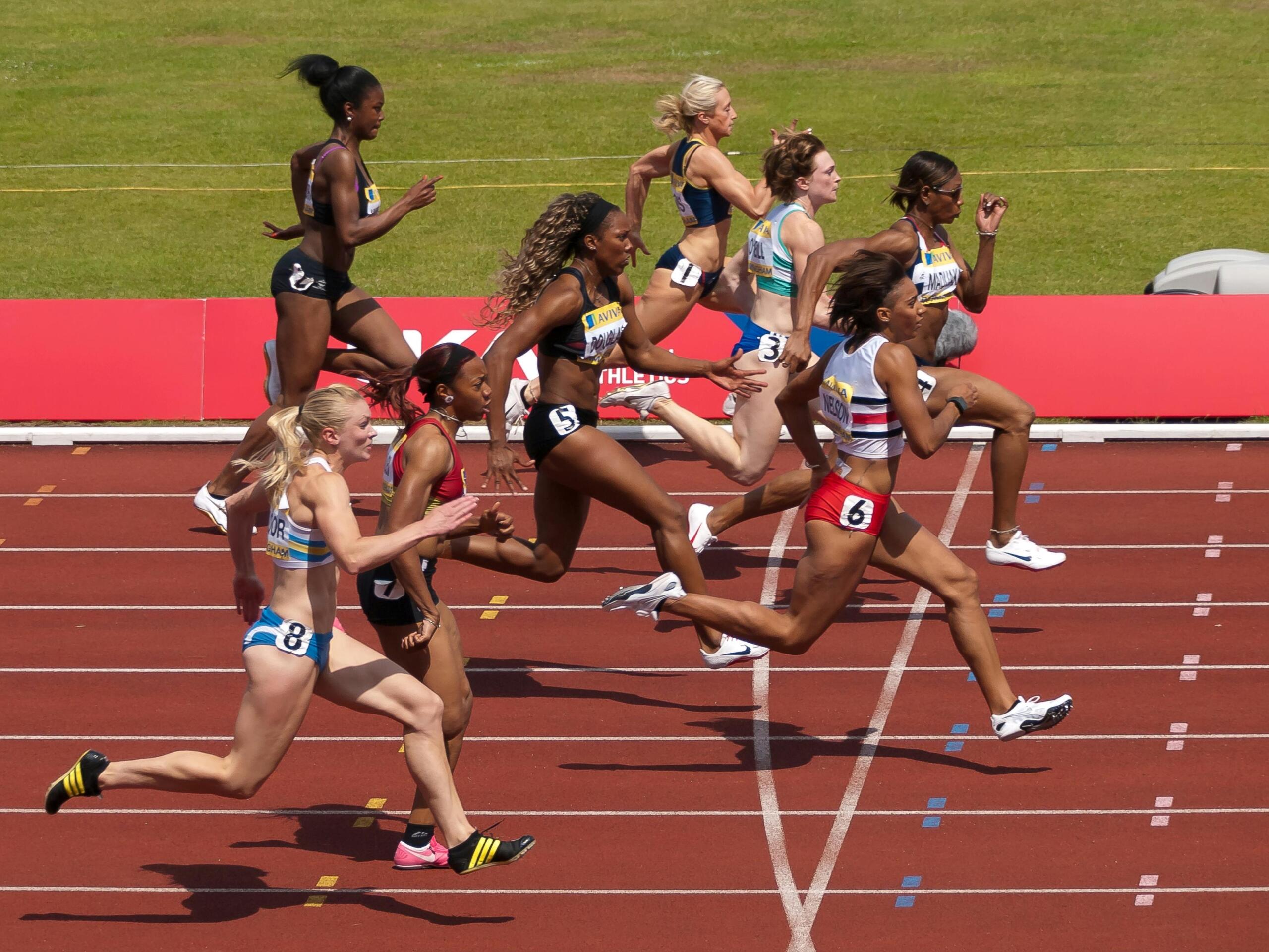 An image of professional athletes on a track.