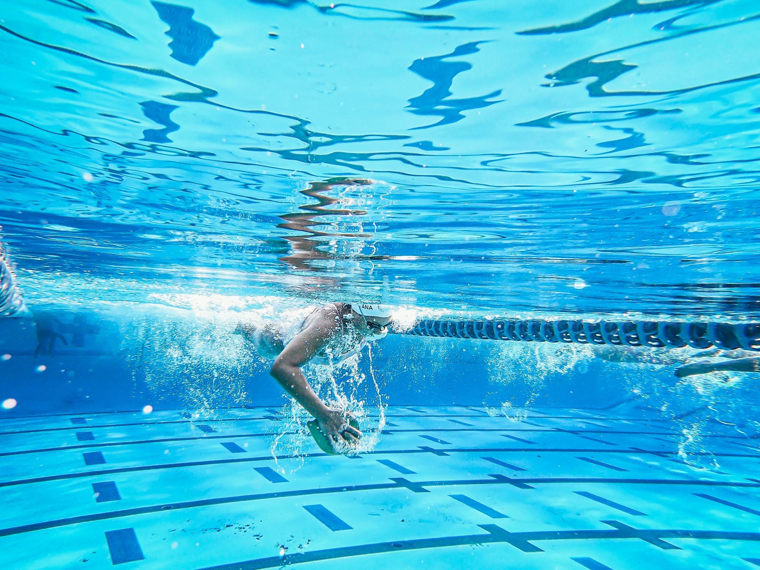 image of person swimming underwater