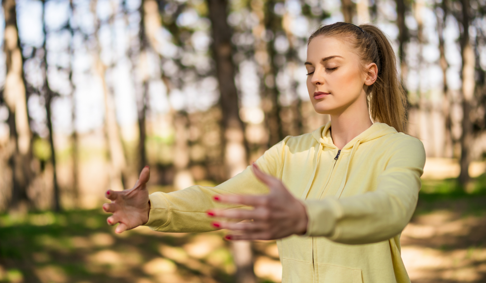 An image of a woman in a meditative state during Tai Chi 