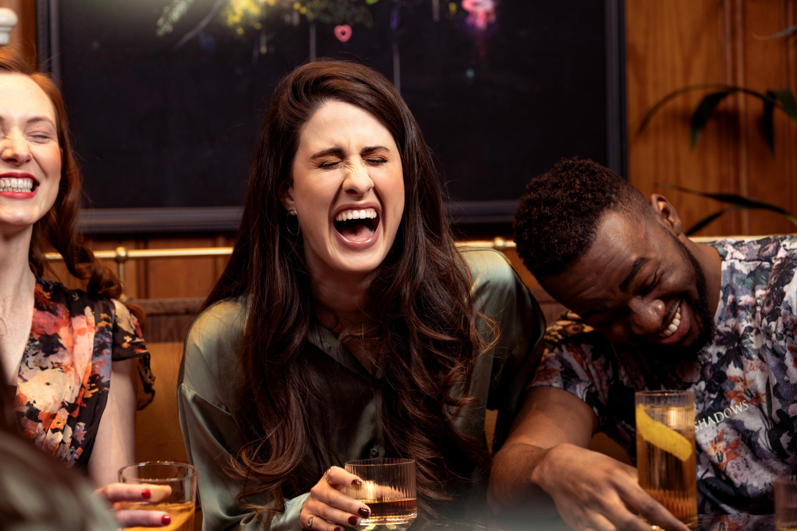 An image of a group of friends sharing some humour. 