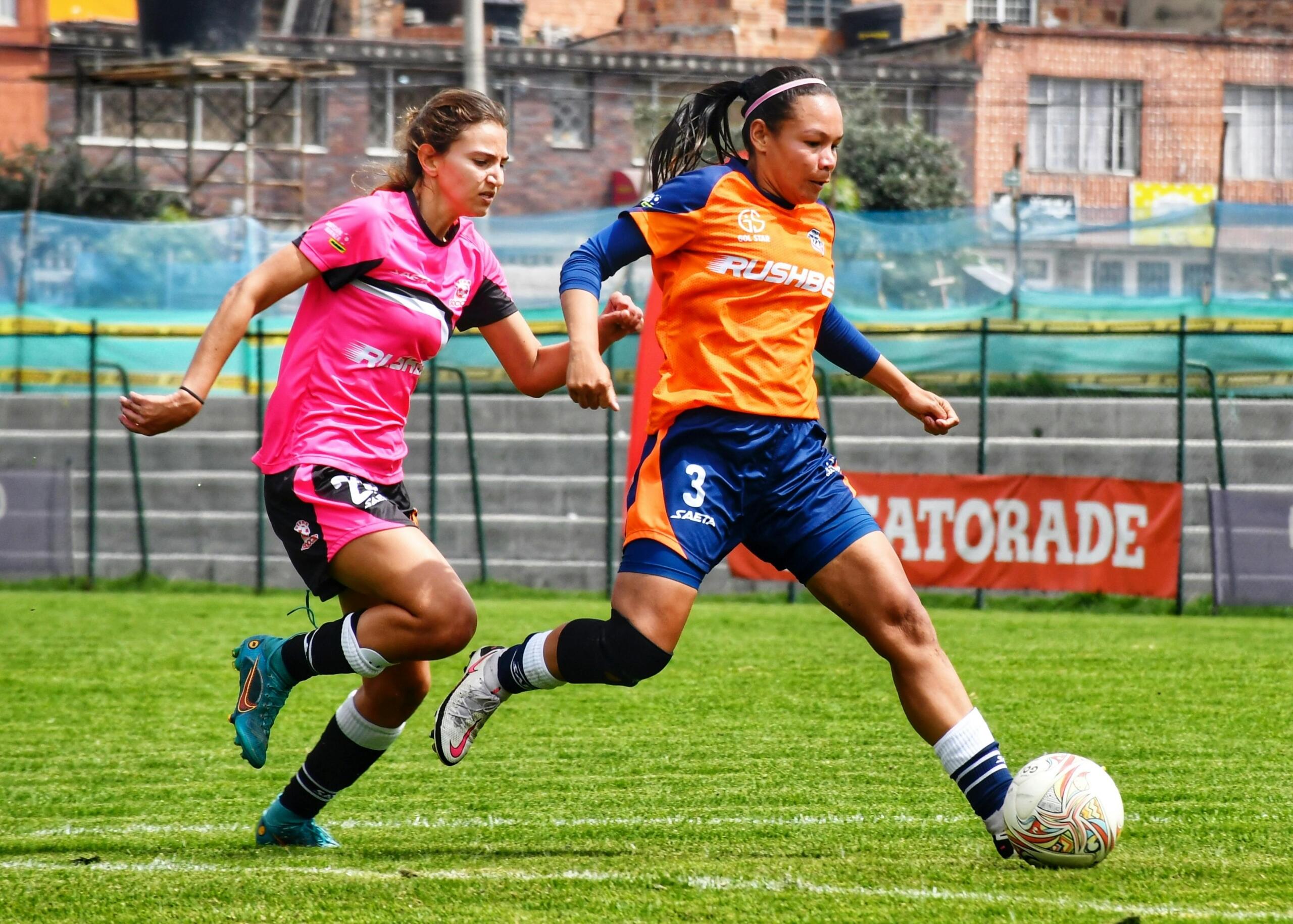 An image of women playing soccer.