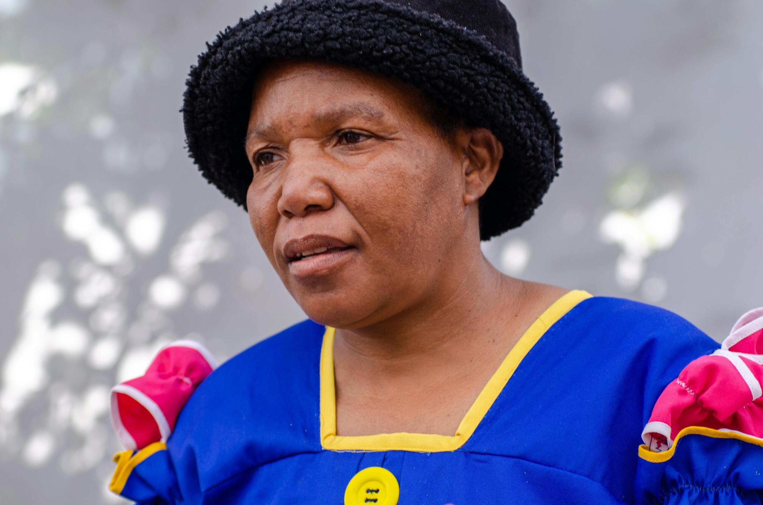 An image of a South African woman looking distinct in her culture.