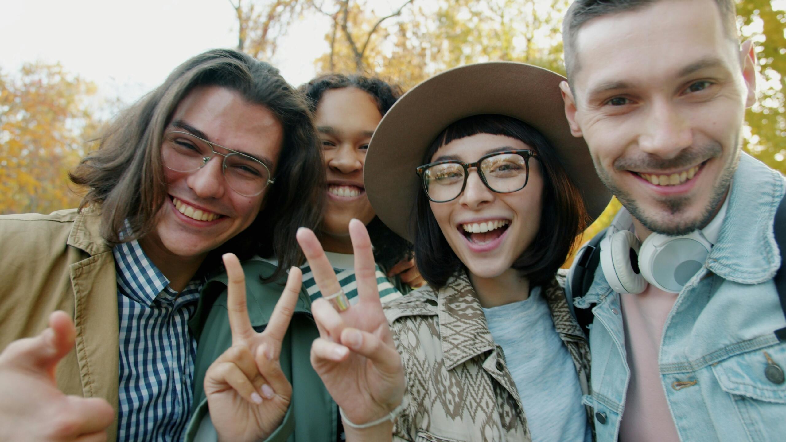 An image of young people engaging with each other and the camera. 