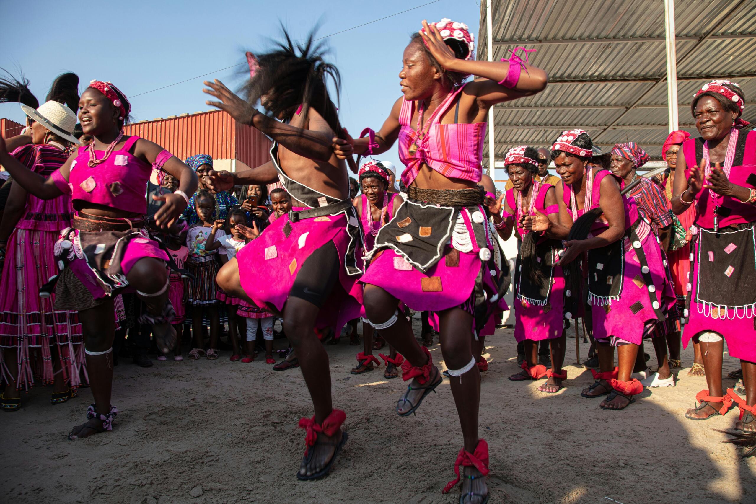 An image of energetic Tsonga dancers in full costume.