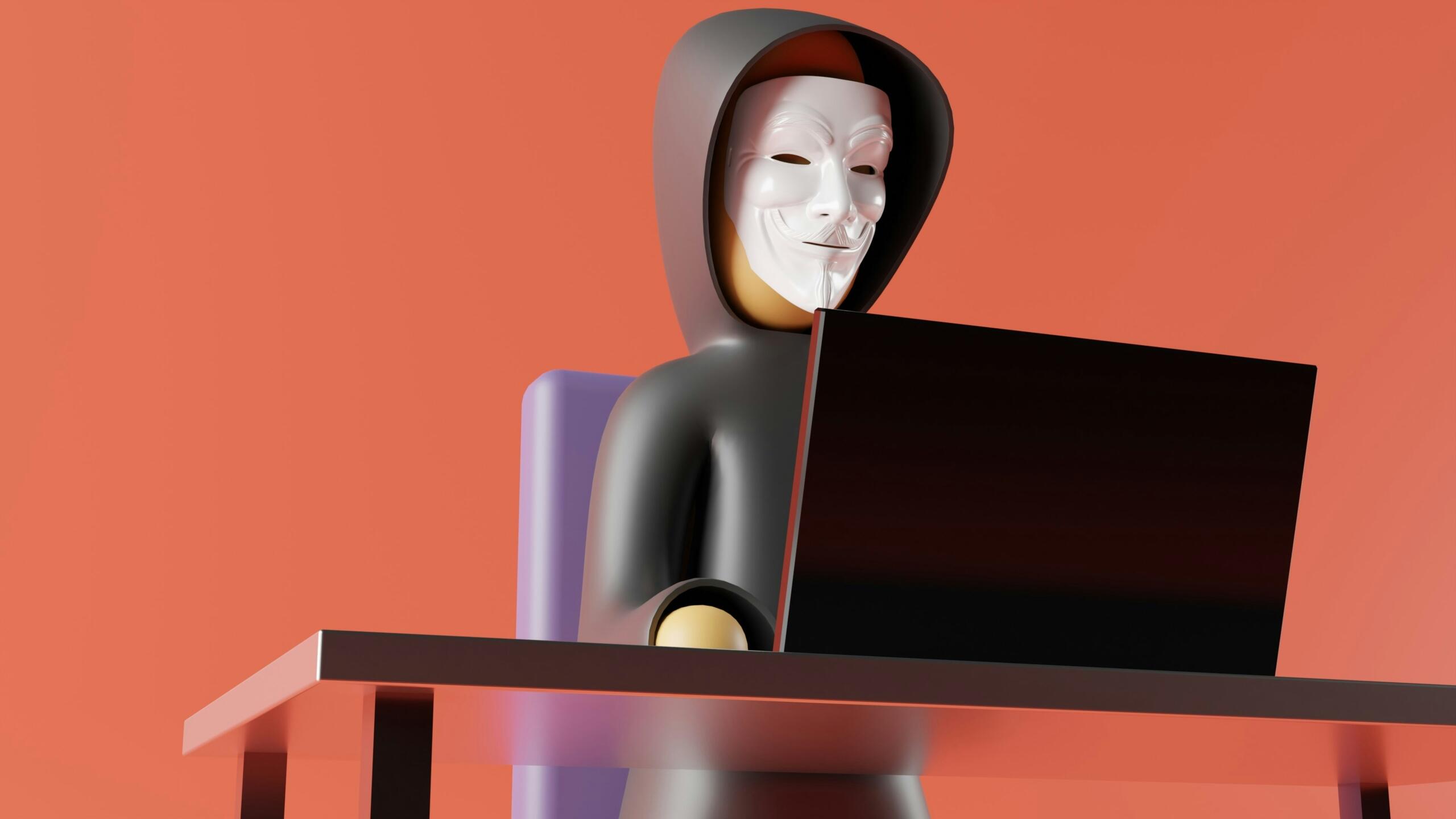 Man with a mask on a laptop