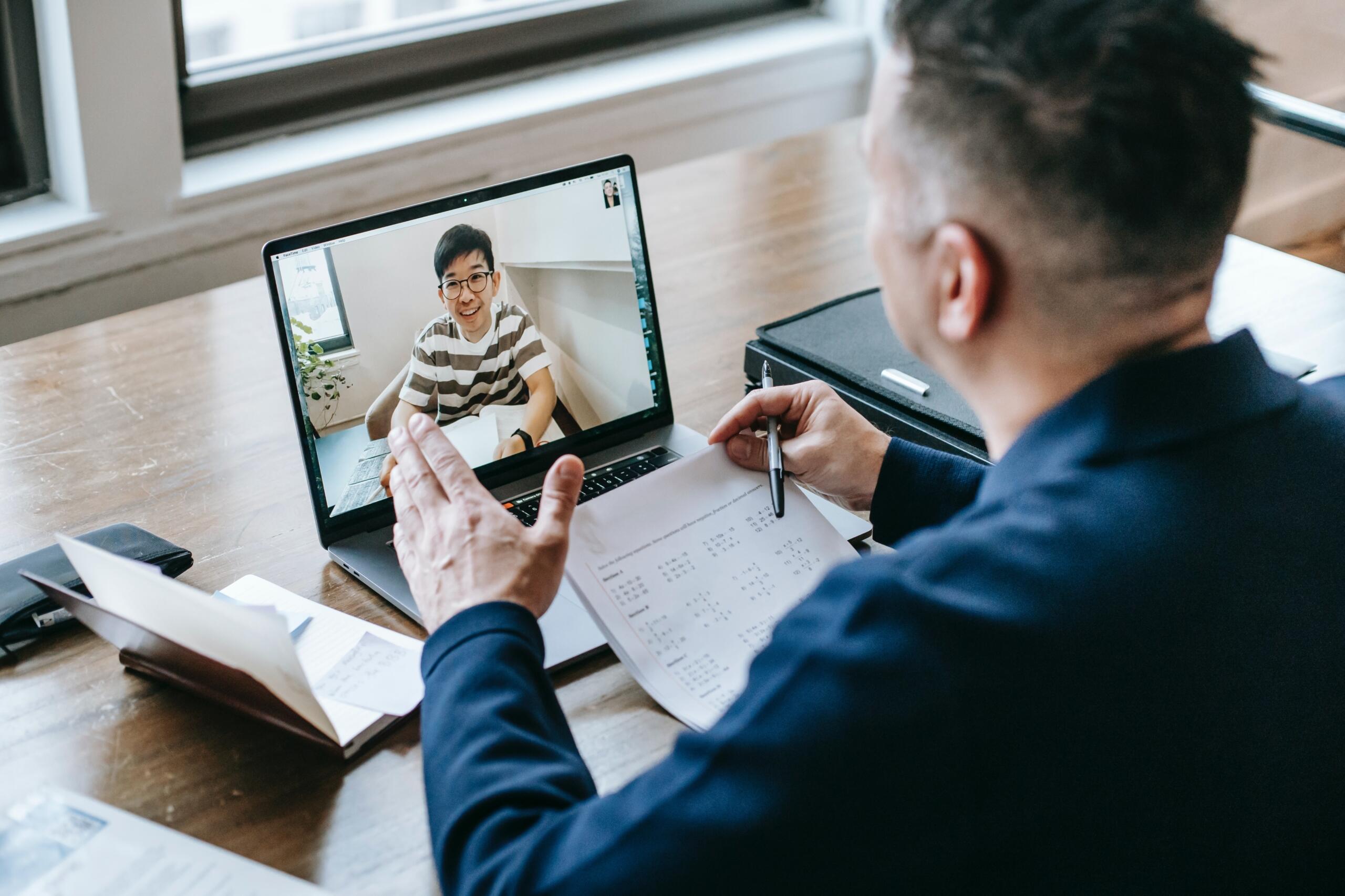 tutor connecting to an online lesson with student