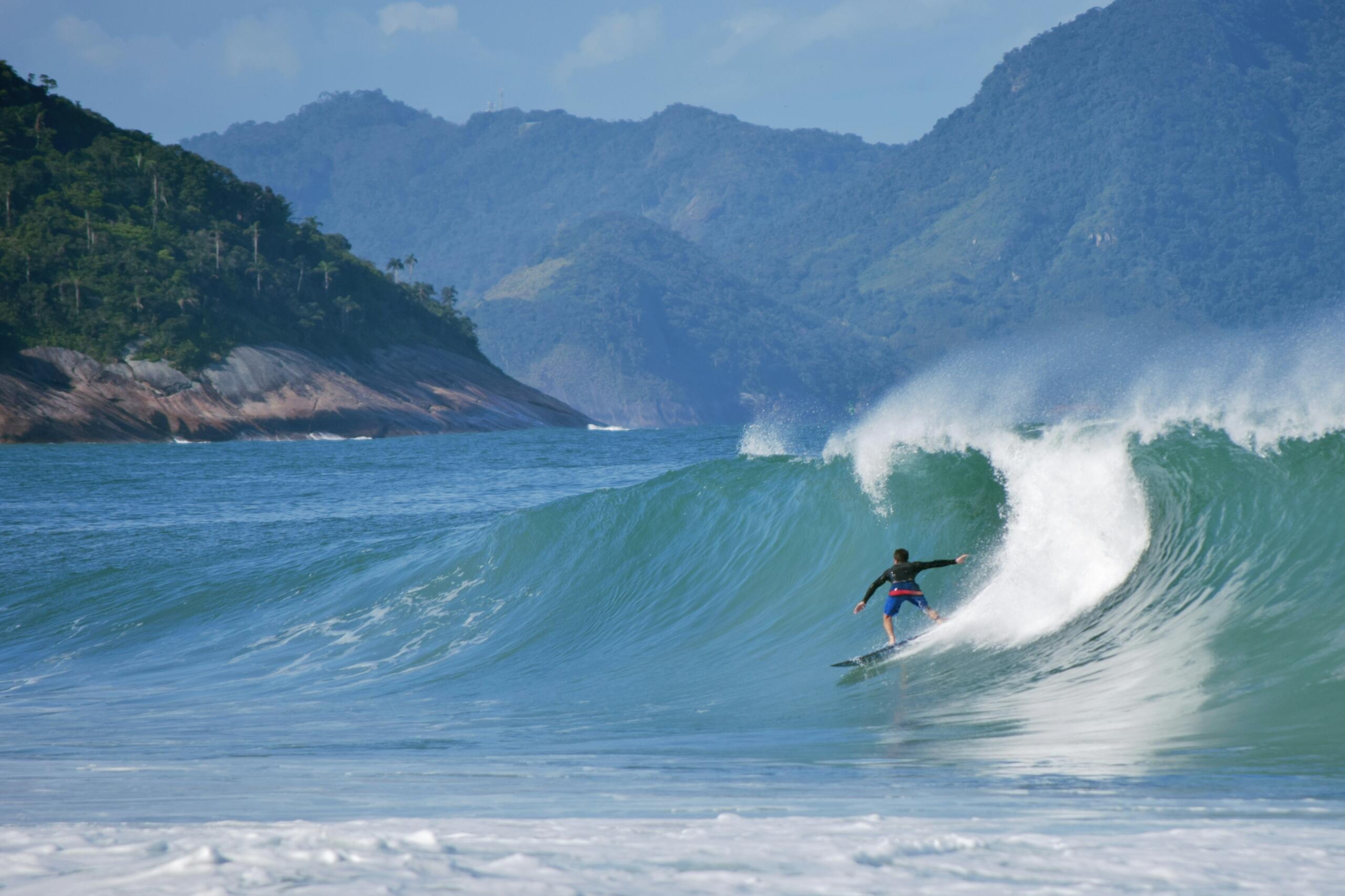 a-man-surfing-on-a-wave