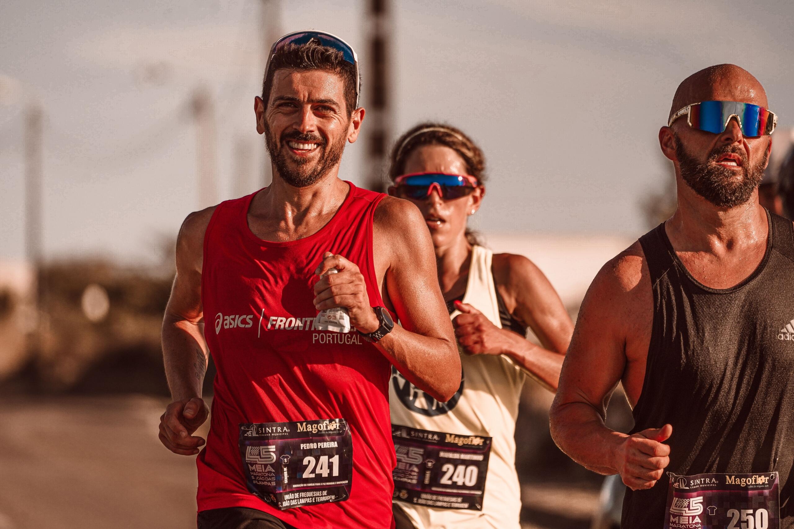 A group of club athletes race in a pack.