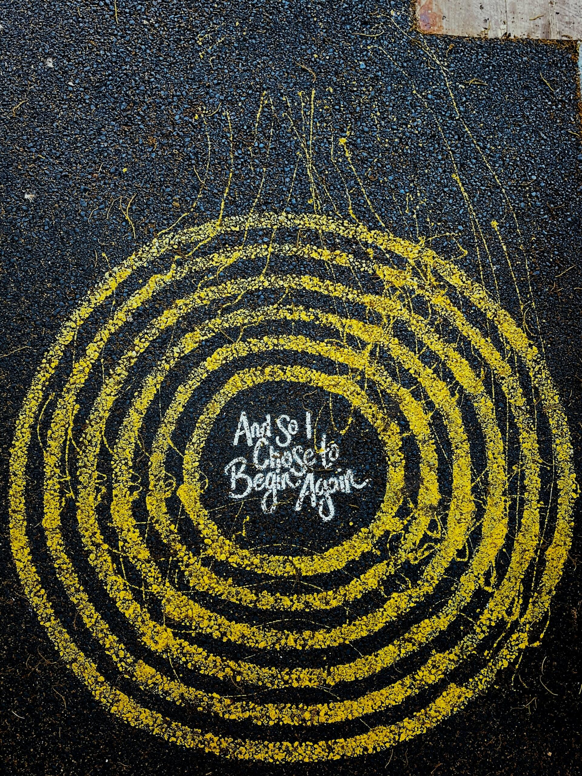 An image of a yellow painted labyrinth.