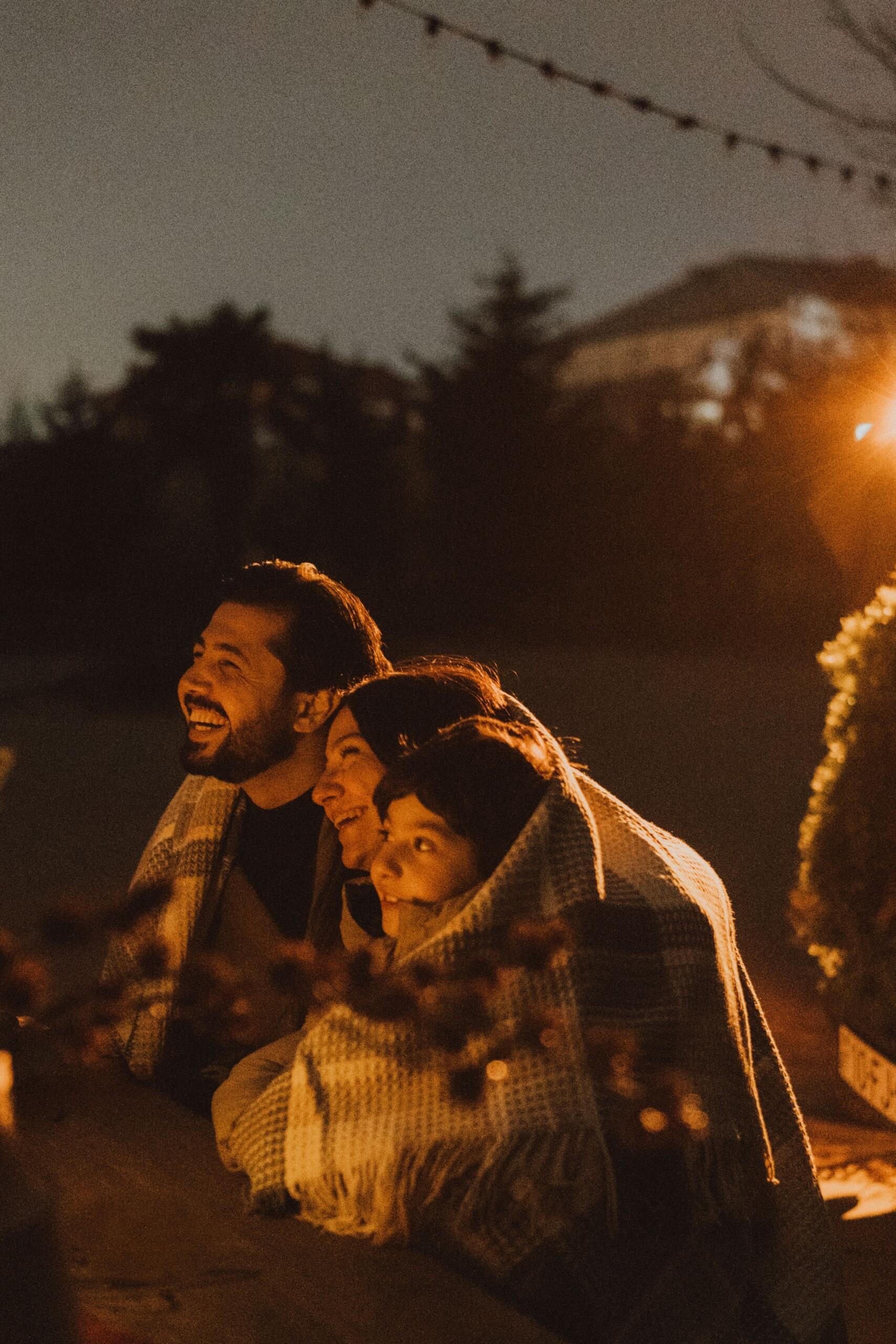 An image of a family enjoying an evening outdoors.