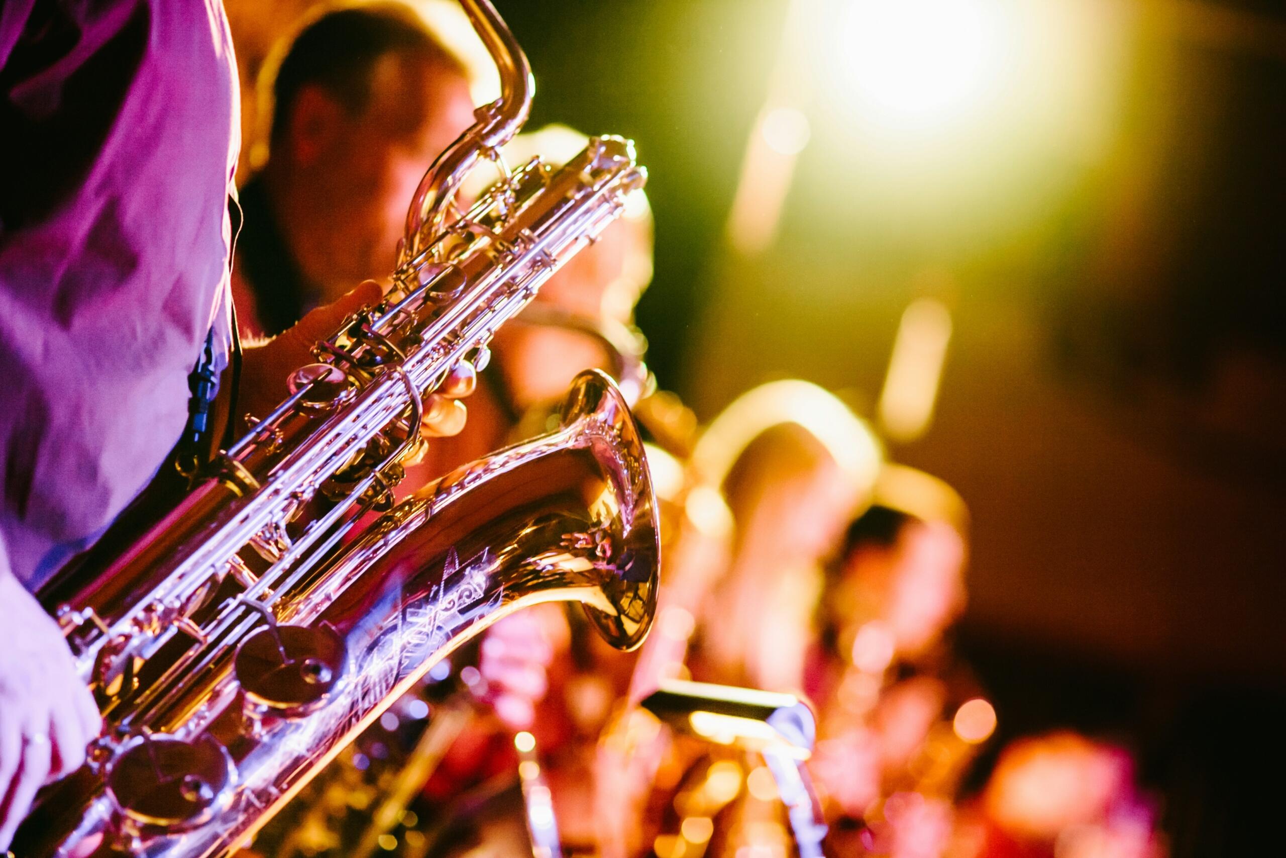 A close up view of brass instruments making sound.
