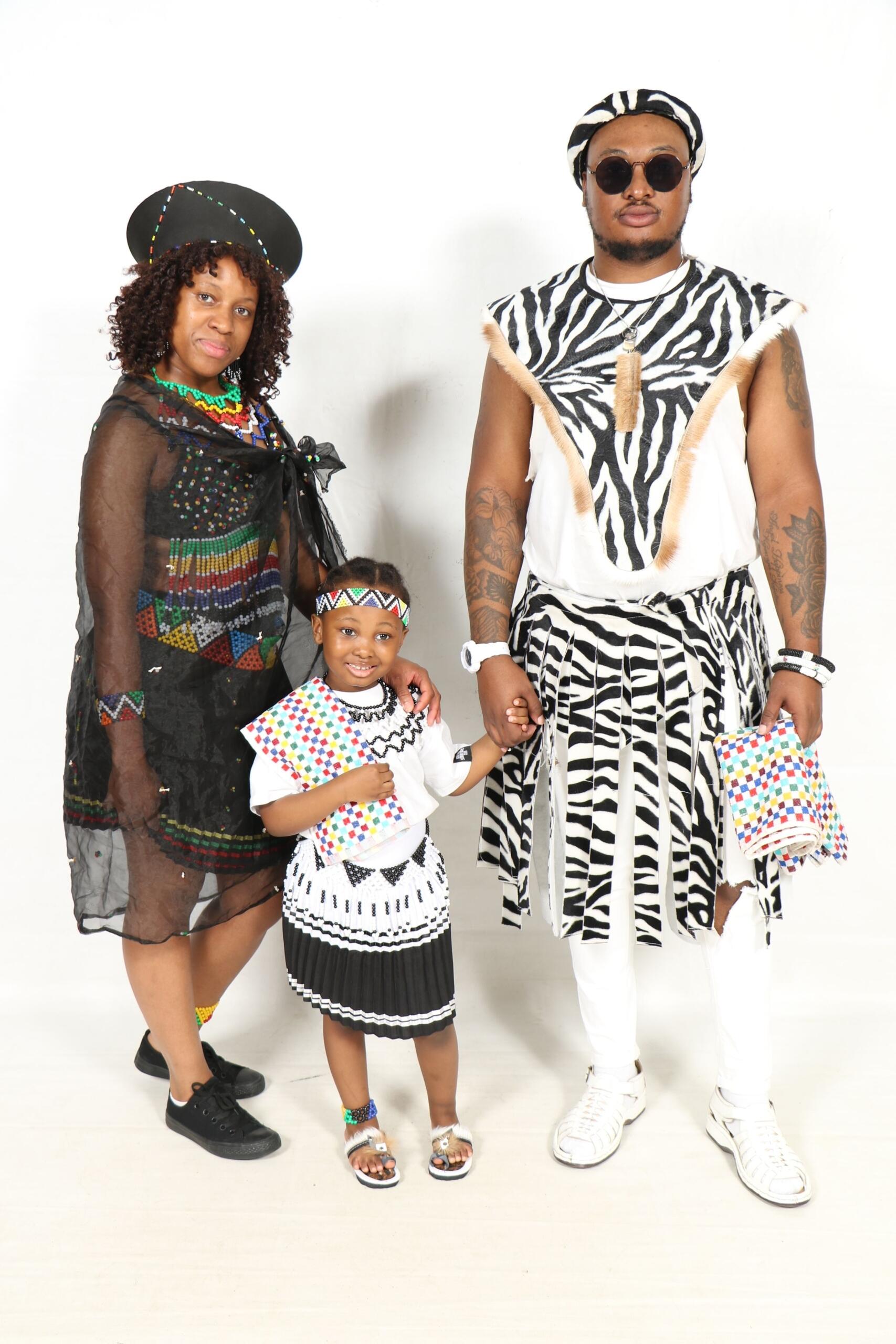South African family wearing colourful traditional clothing and beadwork.