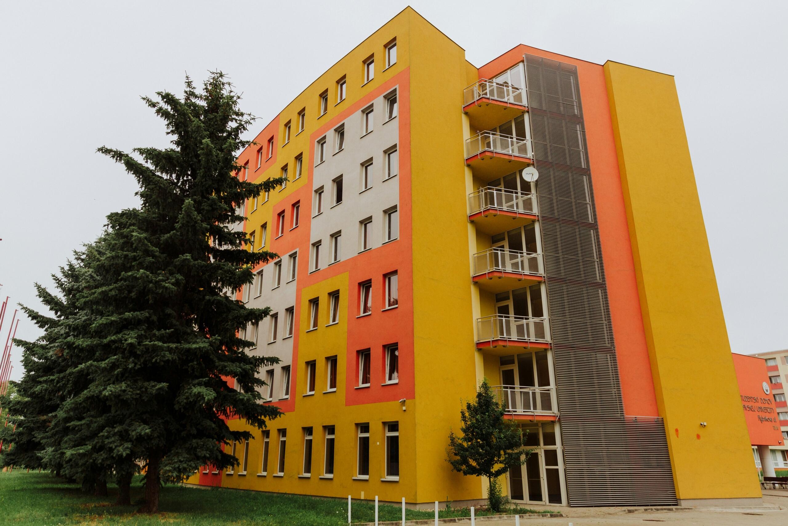 Student accommodation building with colourful multi-storey residential blocks.