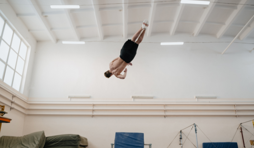 gymnast upside down in the air